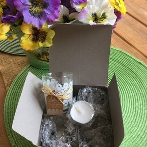 Set of 4 votive candle holders with tea lights.